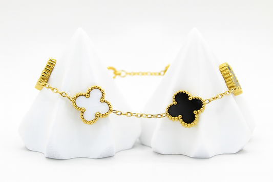 Elegant Gold Clover Bracelet with Black & White Motifs