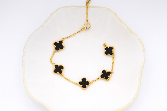 Elegant Gold Clover Bracelet with Black Onyx Charms