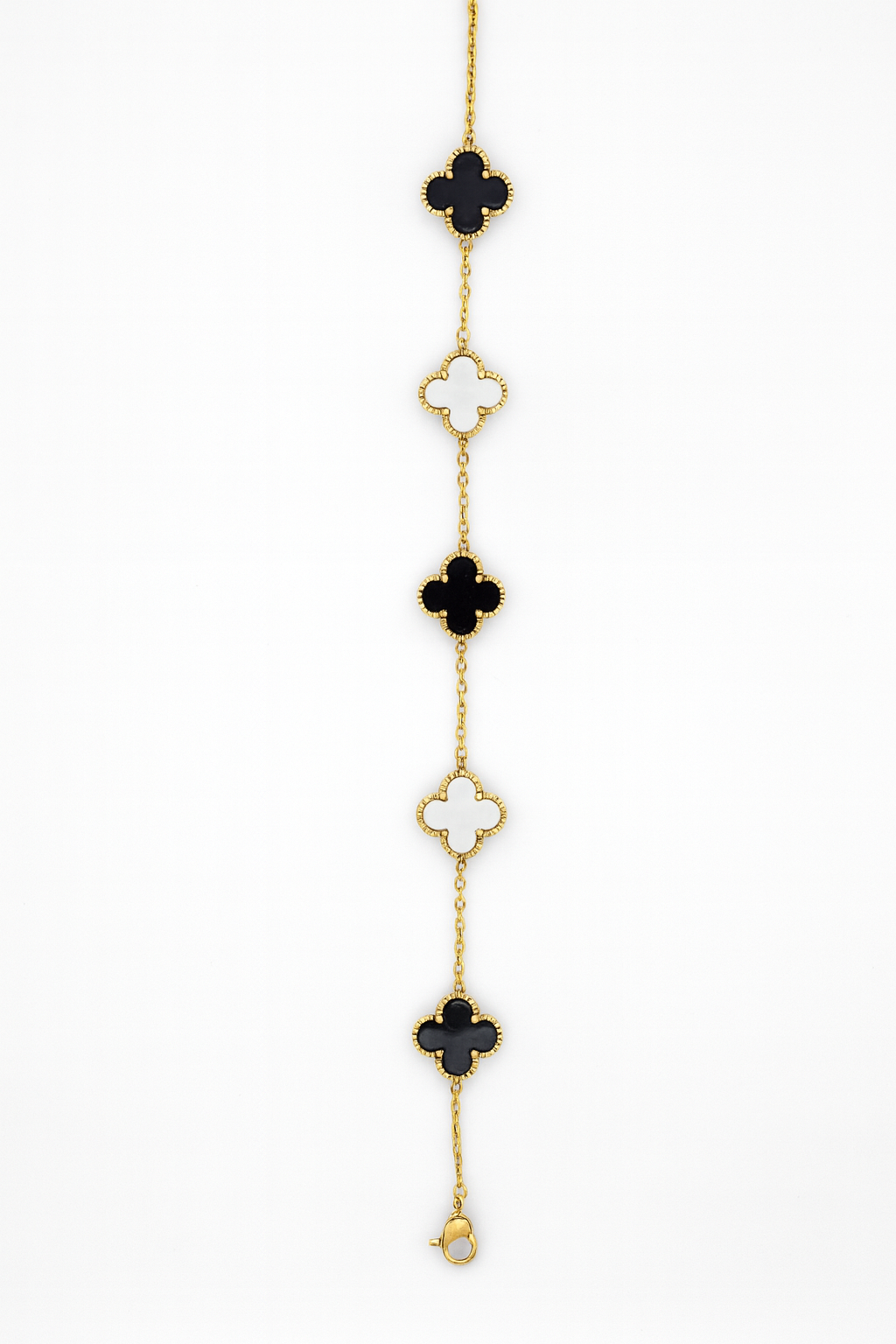 Elegant Gold Clover Bracelet with Black & White Motifs