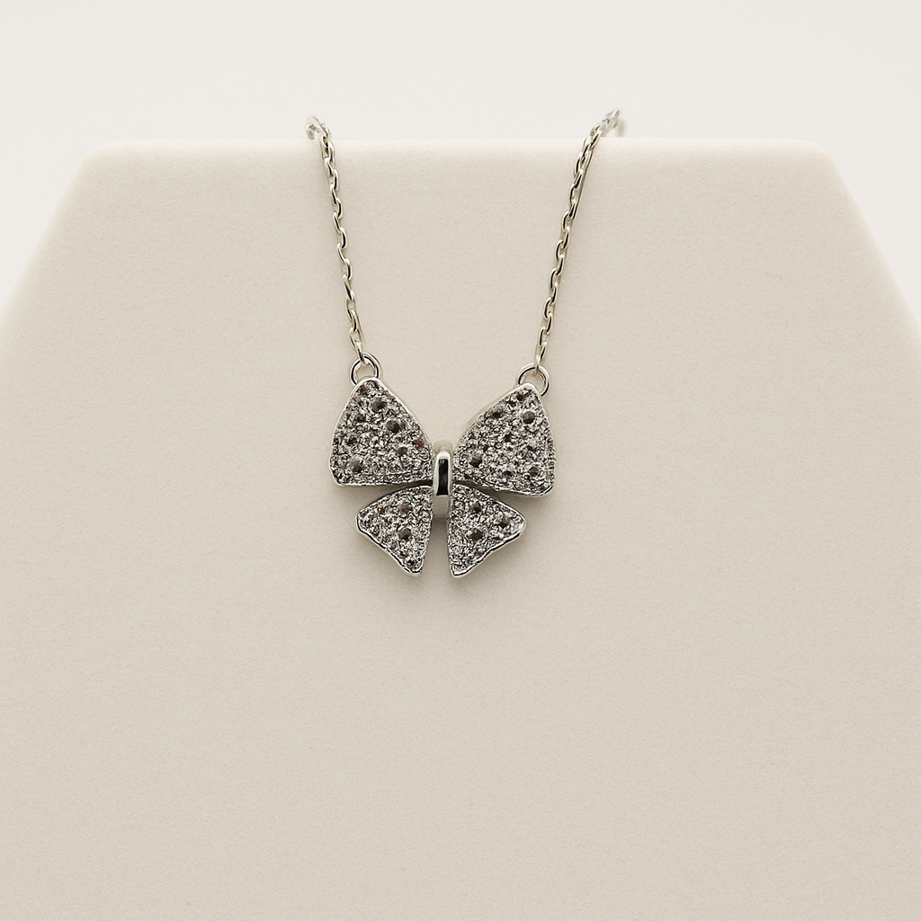 Elegant Bow Pendant Necklace with Sparkling CZ Stones
