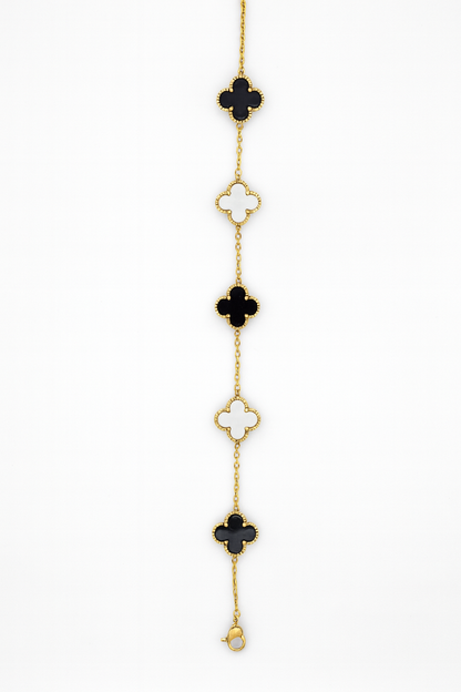 Elegant Gold Clover Bracelet with Black & White Motifs