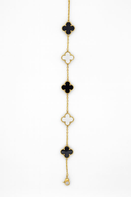 Elegant Gold Clover Bracelet with Black & White Motifs