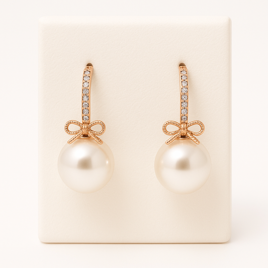 Elegant Pearl Drop Earrings with Bow Accent